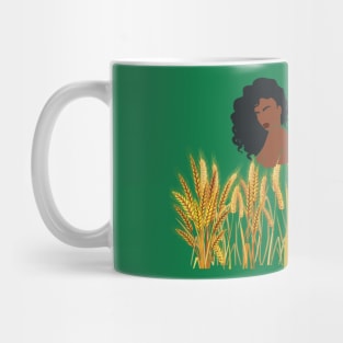 Afro woman behind the spike grains. Mug